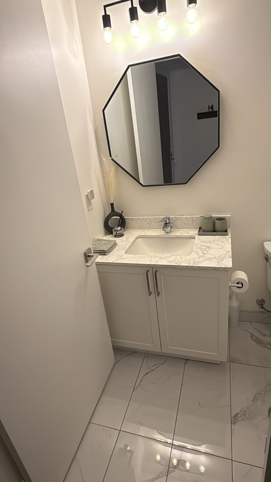 Guest-ready bathroom vanity and polished floor