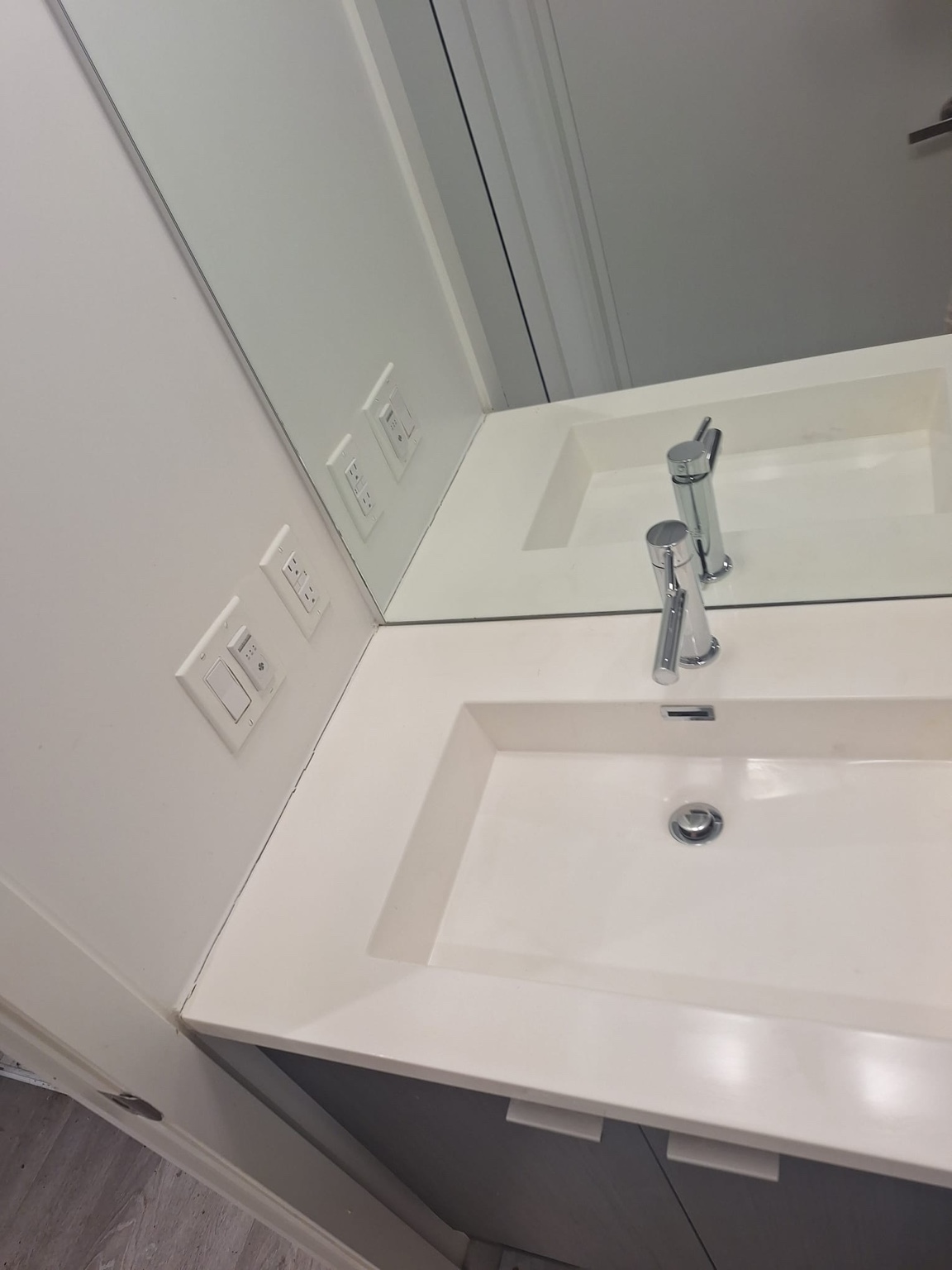 Bathroom vanity after Aman Cleaning Service