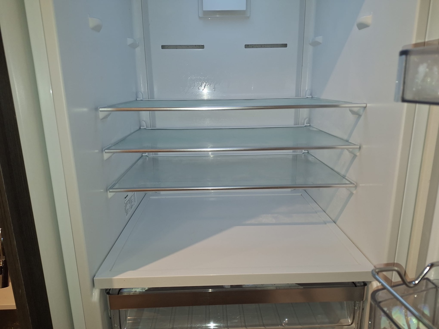 Refrigerator detail after Aman Cleaning Service