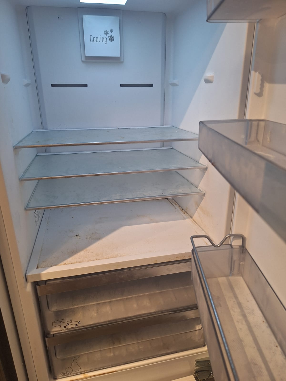 Refrigerator detail before move cleaning