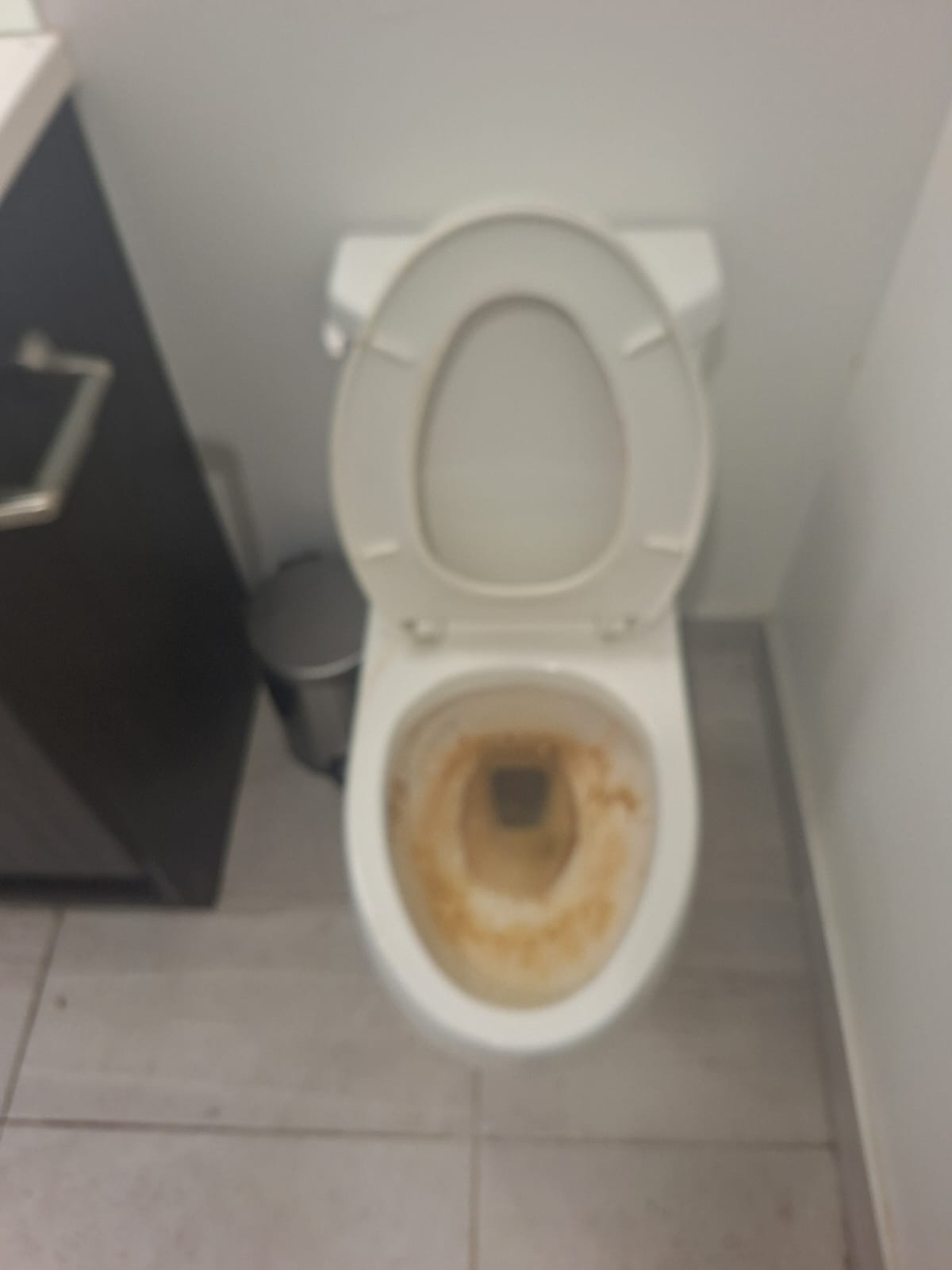 Bathroom toilet before move cleaning