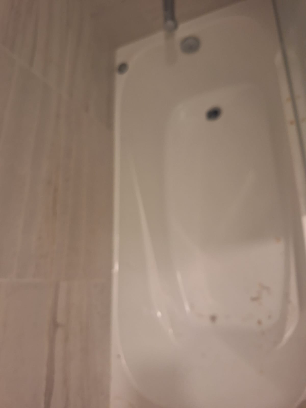 Bathtub detail before move cleaning